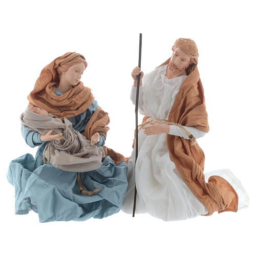 Kneeling nativity in Light blue and brown finish 23cm 1