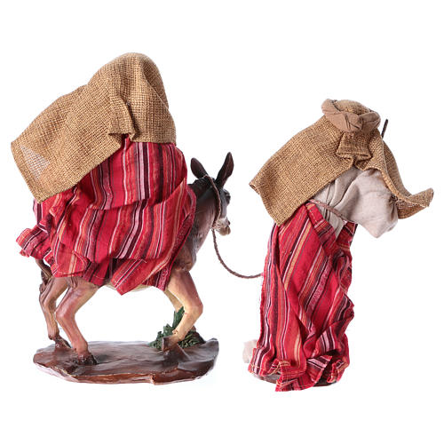 Flight into Egypt in 2 pieces, resin and fabric, red mantles 24 cm 5