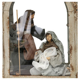 Escena de la Natividad 20 cm en linterna ovalada 50x30x15
