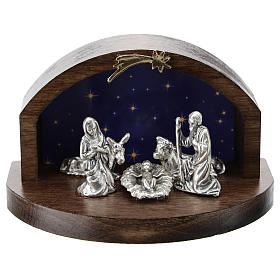 Nativity in metal with curved wood shack 5 cm