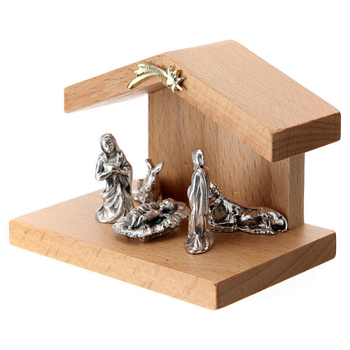 Nativity scene in metal with pear wood shack 5 cm 2