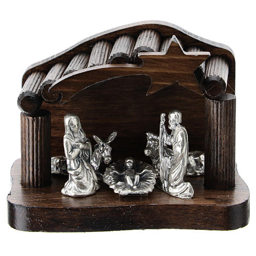 Nativity in metal with dark wood shack 5 cm 1