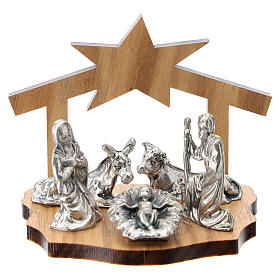 Nativity in metal with wood shack 5 cm