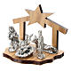 Metal Nativity with stylized grotto in olive wood 5 cm s2
