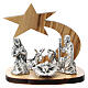 Weihnachtsgeschichte vor Sternschnuppe aus Holz mit Metallfiguren, 5 cm s1