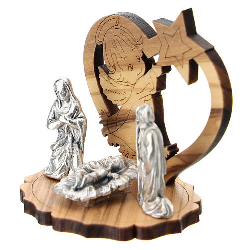 Holy Family in metal with angel and star wood 5 cm 2