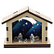 Nativity in metal with wood shack and printed sky in the background 5 cm s1