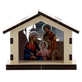 Motiv der Heiligen Familie in Hütte aus Holz
