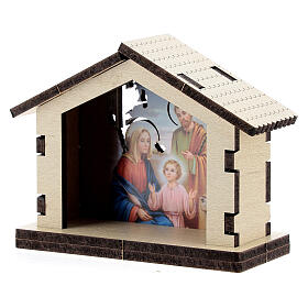 Motiv der Heiligen Familie in Hütte aus Holz