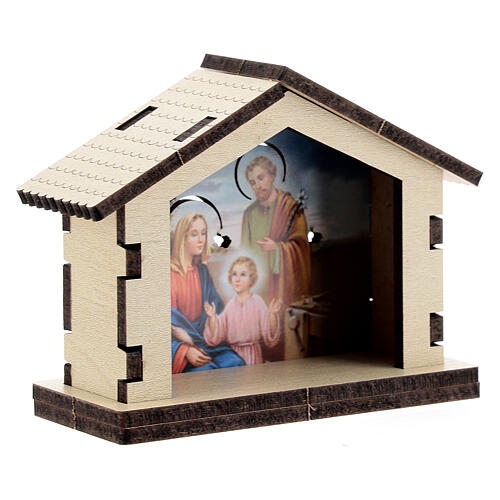 Wooden Nativity stable with Holy Family background 3