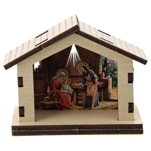Hütte aus Holz mit Motiv der Heiligen Familie im Hintergrund 1