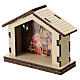 Nativity print on wood shack s2