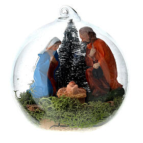 Christmas glass ball of 8 cm with Nativity Scene and snowy trees
