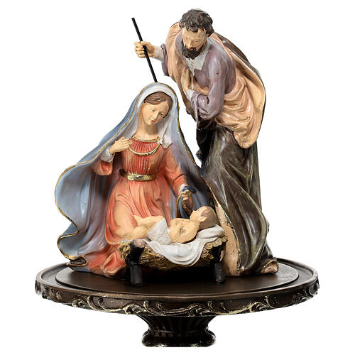 Nativity Scene on a round pedestal under a glass dome 35 cm 2