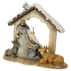 Natividade de Jesus resina com boi e burro sobre base, 18x21,5x9 cm