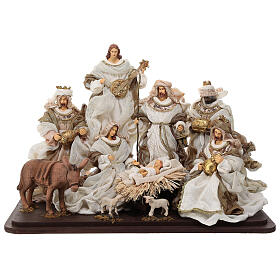 Nativity with Wise Men and angel, wood base, resin and fabric, 30 cm