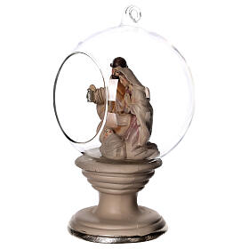 Nativity in a glass globe with a pedestal 8 in