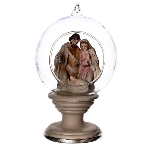 Nativity in a glass globe with a pedestal 8 in 1