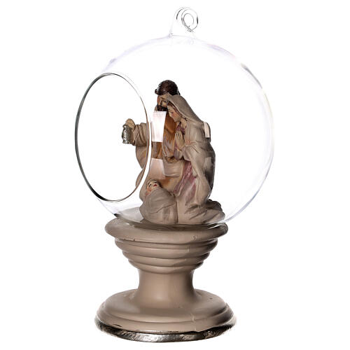 Nativity in a glass globe with a pedestal 8 in 2