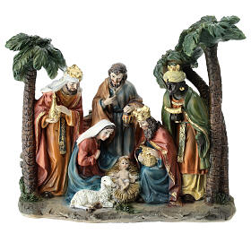 Nativity with Wise Men and palm trees, painted resin, 20x20x10 cm