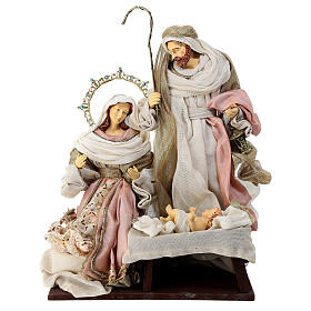 Holy Family on a wooden base, resin and fabric, pink and gold, 40x30x20 cm