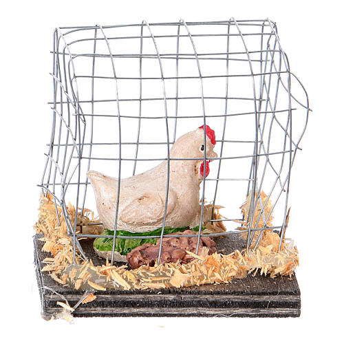 Nativity figurines, white hen in cage 1