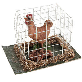 Krippentiere: Braune Henne in Käfig Krippe Krippentiere: Braune Henne in Käfig Krippe