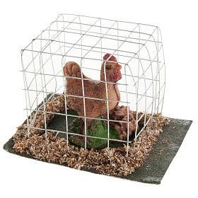 Krippentiere: Braune Henne in Käfig Krippe Krippentiere: Braune Henne in Käfig Krippe