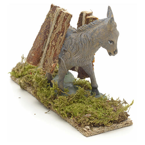 Nativity accessory, donkey with wood measuring 11x14x4cm 2