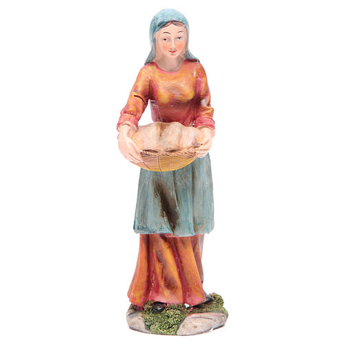 Nativity resin figurine, woman with basket measuring 21cm 1