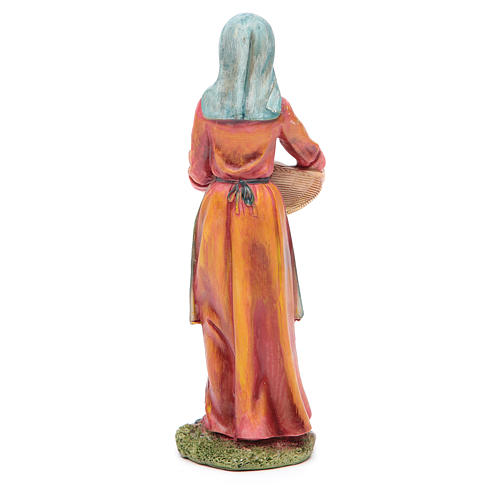 Nativity resin figurine, woman with basket measuring 21cm 2