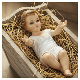 Liegendes Jesuskind mit Augen aus Kristall Landi 27 cm