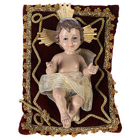 Infant Jesus on a pillow, resin, 20x10x10 cm