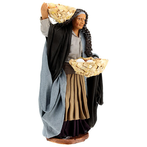 Mujer con cestos de huevos 14 cm. 4