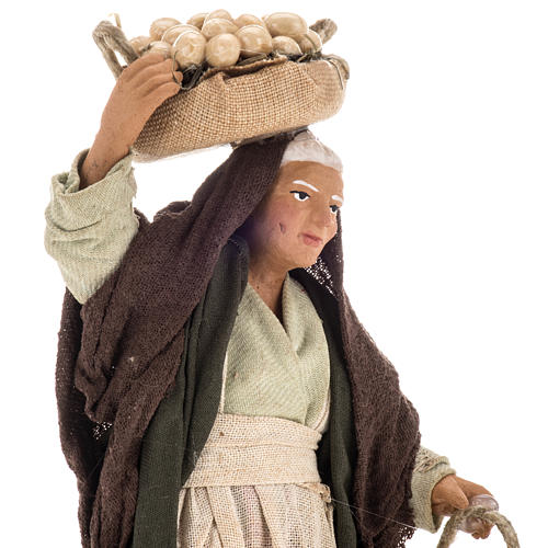 Pesebre mujer anciana con cestas de huevos 14 cm 2