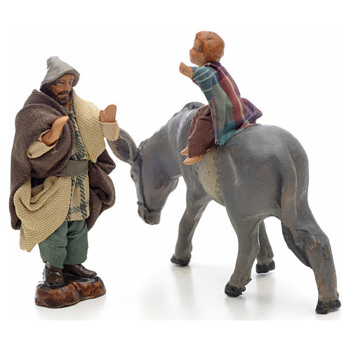 Neapolitan Nativity figurine, child on donkey with shepherd, 8 c 2