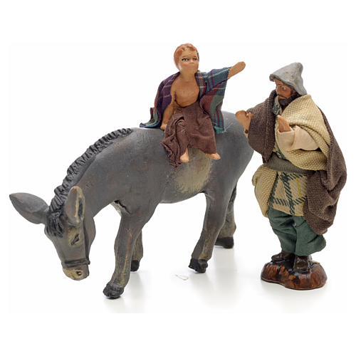 Neapolitan Nativity figurine, child on donkey with shepherd, 8 c 1