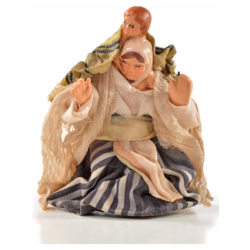 Neapolitan Nativity, Arabian style, woman with baby on shoulders 1