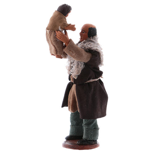 Man lifting child, Neapolitan Nativity 10cm 2