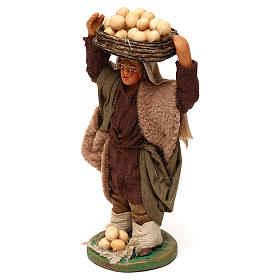 Man with basked eggs on head, Neapolitan nativity figurine 10cm