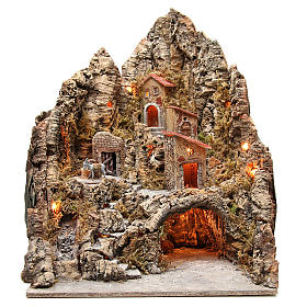 Illuminated village with stream and grotto 68x64x56cm