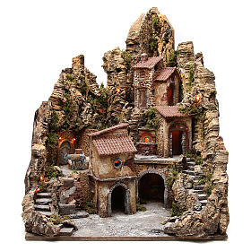 Illuminated village with stream, oven and stable, 80x62x58cm