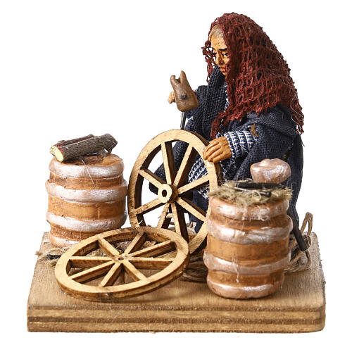 Man fixing wheels 10cm neapolitan Nativity 3