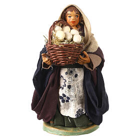 Woman with leather basket in hands 10cm neapolitan Nativity