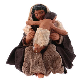 Woman sitting on the floor with baby for Neapolitan Nativity, 10cm