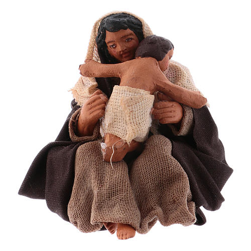 Woman sitting on the floor with baby for Neapolitan Nativity, 10cm 1