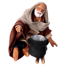 Sitting man with saucepan 10cm, Nativity figurine