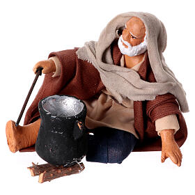 Sitting man with saucepan 10cm, Nativity figurine