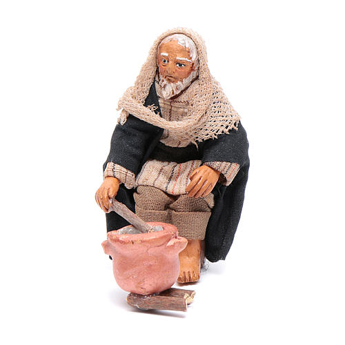 Sitting man with saucepan 10cm, Nativity figurine 1