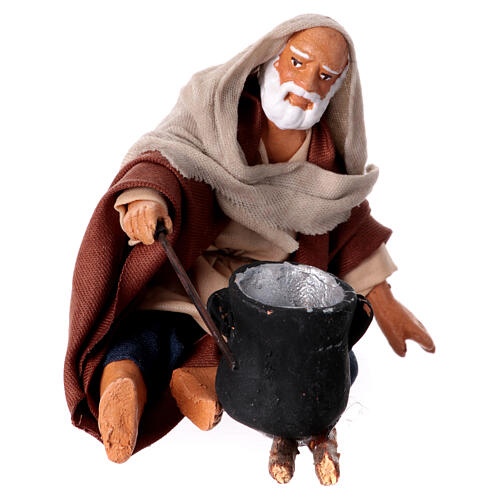 Sitting man with saucepan 10cm, Nativity figurine 1